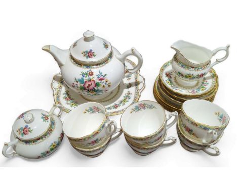 A Coalport "Ming Rose" pattern tea service, comprising of a teapot, milk jug, sugar bowl and six cups and saucers 