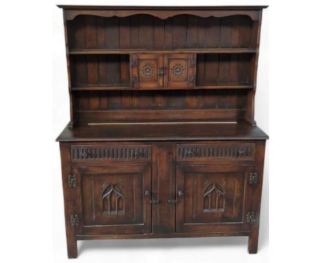 An Ercol/Old Charm elm dresser, with cupboards and drawers below, 140cm, 48cm, 175cm