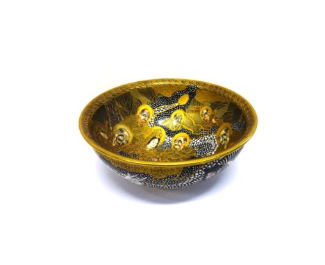 A JAPANESE SATSUMA EARTHENWARE BOWL, MEIJI PERIOD, 1868 – 1912 the deep rounded sides rising from an undecorated foot, profus