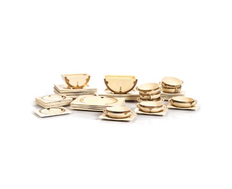 A CLARICE CLIFF 'THE BIARRITZ' PATTERN PART DINNER SERVICE rectangular, gilt Art Nouveau design against a yellow ground, comp