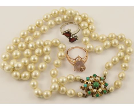 A string of faux pearls with a 9ct turquoise and pearl clasp and two 9ct gem set rings