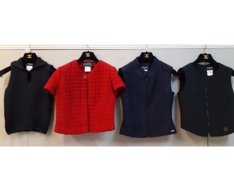 Chanel: Four items of ladies clothing comprising a 2000 Transition Collection navy padded and sleeveless zipped waistcoat, 30