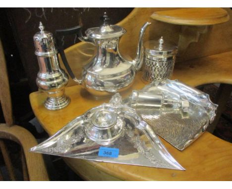 Silver plate to include two crumb scoops, corkscrew, sugar sifter, teapot, tea strainer, and a glass lined container Location