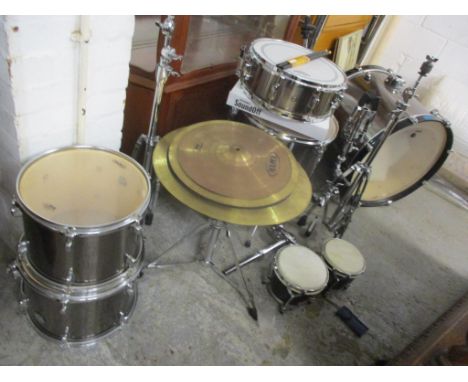 A Mapex drum kit together with a pair of Stagg bongo'sLocation: 