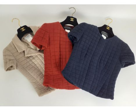 Chanel-Three 2001 Identification padded and short sleeved jackets in light beige, red and navy, two with zip fronts and one w