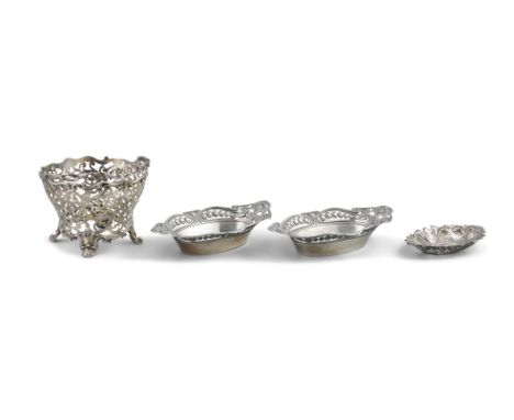 A COLLECTION OF FOUR PIERCED SILVER BASKETScomprising an early Victorian pierced basket frame (lacking liner), London, c.1846