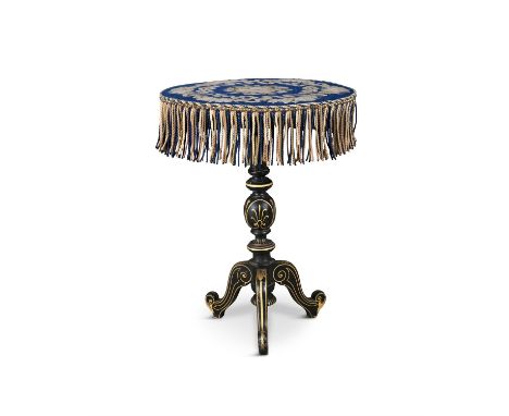 A 19TH CENTURY EBONISED AND PARCEL GILT OCCASIONAL TABLE,with tapestry panelled top. 52cm diameter, 69cm high