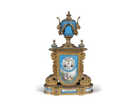A FRENCH GILTMETAL AND PORCELAIN MANTLE CLOCK, 19TH CENTURYsurmounted with the classical urn above a Sevres type porcelain di