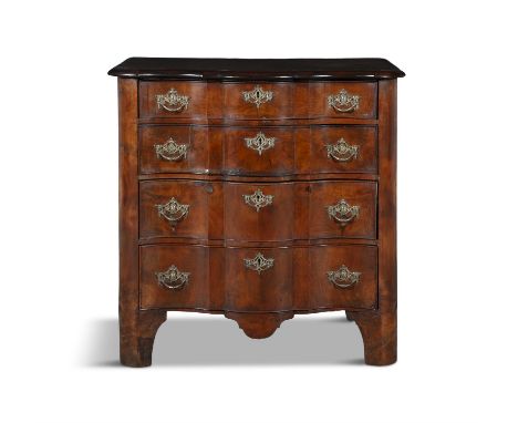 A DUTCH SERPENTINE FRONT CHEST OF DRAWERS the plain top above a four long drawers with brass drop handles in form of classica