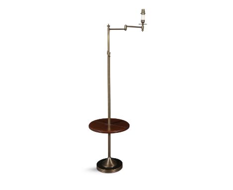 A BRASS FRAME ANGLEPOISE READING LAMP,with swing arm light and adjustable tubular stem, with a circular timber platform and w