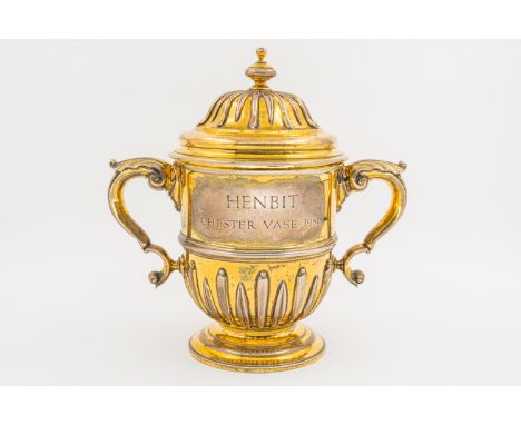 A SILVER GILT CHESTER VASE TWIN HANDLED TROPHY CUP AND COVEREngraved Henbit Chester Vase 1980, with maker's mark Harman & Co 