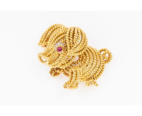 VAN CLEEF AND ARPELS - A RUBY AND DIAMOND PIG BROOCHIn the form of a pig, with a cabochon ruby and diamond set eye, with rope