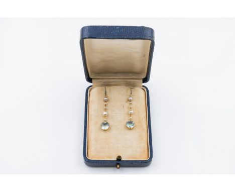 A PAIR OF EDWARDIAN AQUAMARINE AND PEARL DROP EARRINGSEach featuring a round cut aquamarine, suspended from a drop of pearls,