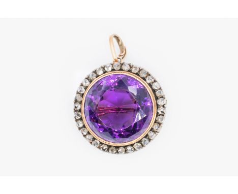 A VICTORIAN AMETHYST AND DIAMOND PENDANT/BROOCHSet with a round faceted amethyst, in a rub over setting, surrounded by rose c