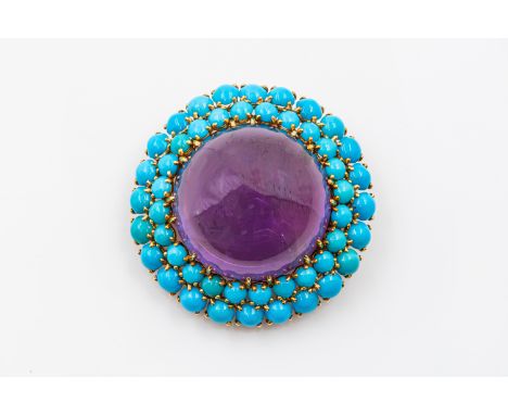 MONTURE CARTIER - AN AMETHYST AND TURQUOISE BROOCHSet with a central large cabochon amethyst with a two row border of turquoi