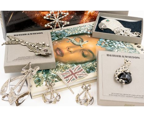 A COLLECTION OF EARLY BUTLER WILSON JEWELLERY WITH OTHERS (QTY)Including, a matching brooch and earring set featuring masks, 