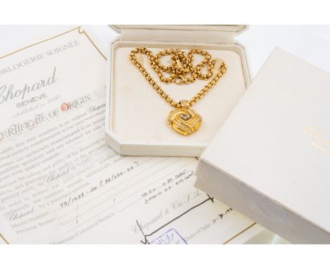 A CHOPARD 'HAPPY DIAMONDS' GOLD HEART PENDANT AND CHAINThe heart shaped pendant in a knotted design and decorated with round 