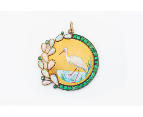 AN UNUSAL GEMSET PENDANTDepicting an enameled Egret in water, with a border of emeralds and opals, with pendant loop, in unma