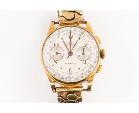 A CHRONOGRAPH SUISSE GOLD WATCHWith silvered dial and gilded hour markers, on a bracelet strap, the case back engraved and da