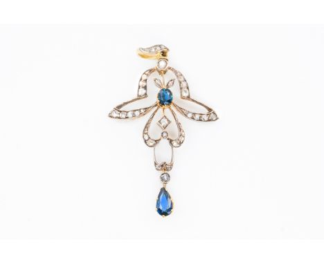 FABERGE - A SAPPHIRE AND DIAMOND PENDANT BROOCHOf openwork design, with central and pendant sapphires and further decorated w