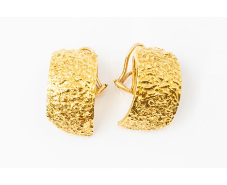 A PAIR OF TEXTURED GOLD EARRINGSThe half hoop earrings each with a bark textured finish, with clip back fittings, in unmarked