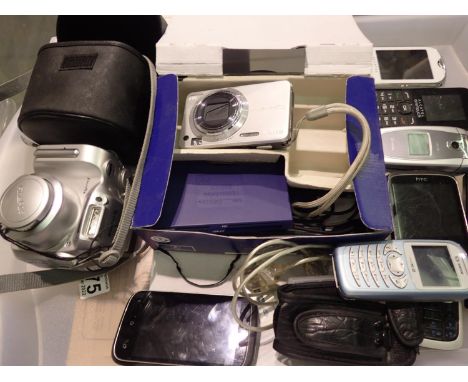 Seven mixed mobile phones with a Fuji Finepix camera. P&amp;P Group 2 (£18+VAT for the first lot and £3+VAT for subsequent lo
