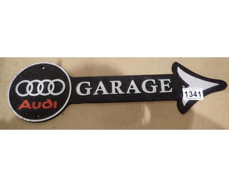 Cast iron Audi garage arrow, L: 40 cm. P&amp;P Group 1 (£14+VAT for the first lot and £1+VAT for subsequent lots) 
