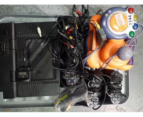 Mixed Playstation controllers and peripherals with a VTech video game console. Not available for in-house P&amp;P 