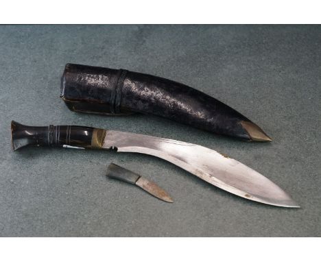 A Gurkha kukri knife complete with original scabbard. 