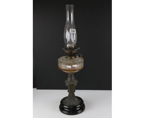 Late 19th century Oil Lamp with Cast Metal and Ceramic Base, 68cms high 