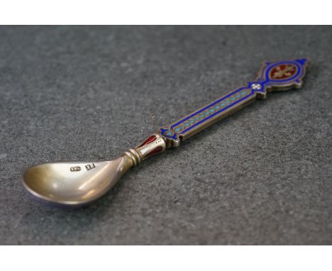 A hallmarked Russian silver and enamel decorative spoon. 