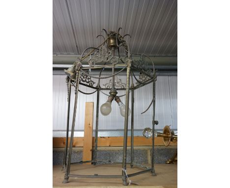 Large Georgian style Gilt Metal Hexagonal Hall Lantern with applied Ram Head Masks, with three branch light fitting, lacking 