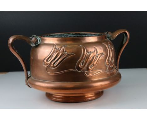 Art Nouveau Copper Planter / Jardiniere with embossed decoration of stylised tulips and twin stylised handles, 20cms high 