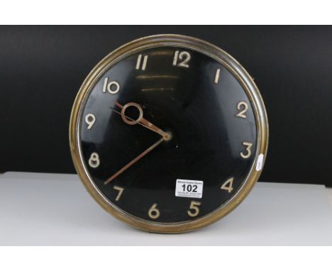 Art Deco Circular Wall Clock with gilt metal frame and black enamel face, 30cms diameter 