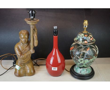 Three Ceramic Table Lamps, one brown glazed in the form of a Chinese Figure, another in the form of a Jar and Lid and the thi