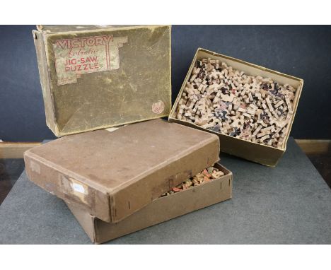 Two vintage wooden jigsaw puzzles to include a Victory example. 