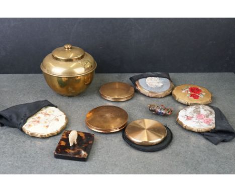 A small collection of powder compacts to include Stratton examples together with a souvenir Liptons tea caddy from the Britis