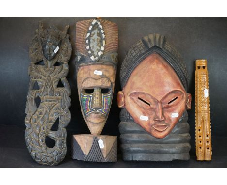 Three Wooden Tribal Items including Two Face Masks, Carved Panel together with a Scandinavian Wooden Carved Flute 