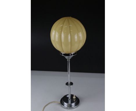 Art Deco Table Lamp with a Yellow Ribbed Glass Bulbous Shade held on a Chrome Base, 46cms high 
