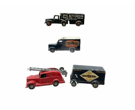 Timpo Toys - four unboxed and playworn die-cast commercial vehicles comprising Smiths Crisps van; Pickfords Removers van; Eve