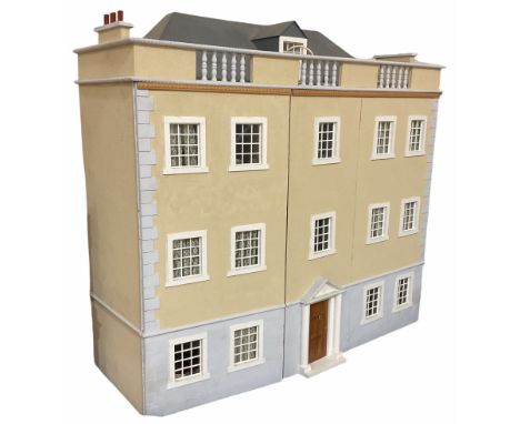 Georgian style wooden double fronted three-storey dolls house with textured rendering finish to the upper floors and parapet 