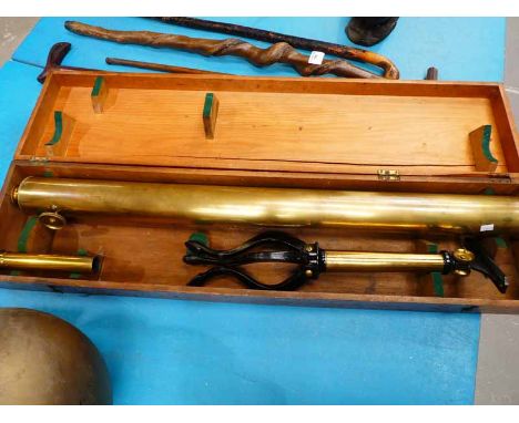 A 19th Century brass two draw telescope on brass and cast iron tripod base, main table 7.5cm dia x 95 cm long in pine case