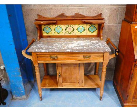 An Edwardian satinwood marble top and tile back wash stand