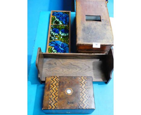 A wooden counter top ringing cash till, tunbridge style trinket box oak book trough and framed display of 3 tiles