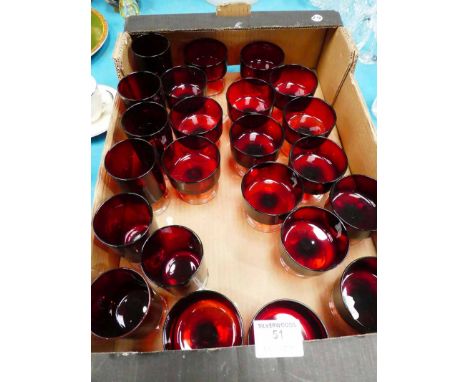 Seven ruby glass goblets and sixteen similar sundae dishes