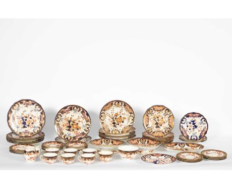A quantity of Derby Imari pattern dinner wares, and Royal Crown Derby Imari tea wares, heightened in gilt. (58 qty)