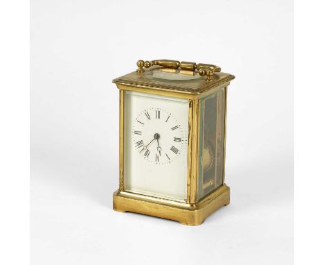 A gilt brass bell striking carriage clock with later replaced lever platform, the back marked Aiguilles, 16.5cm high handle u