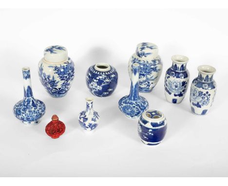 A quantity of Chinese blue and white ceramics, to include a pair of lidded ginger jars, a pair of vases etc (9)One of the bot