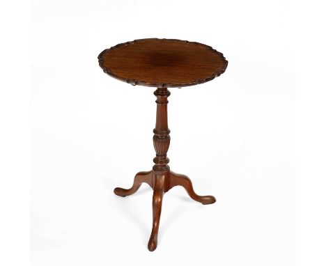 A George III style tripod table, the tip-up-top with pie crust edge, 48.5cm diameter, 69cm high