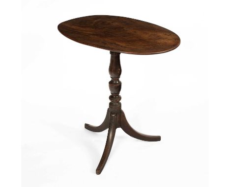 A mahogany tripod table, the oval top on an associated base, 75cm wide, 51.5cm deep, 74cm high